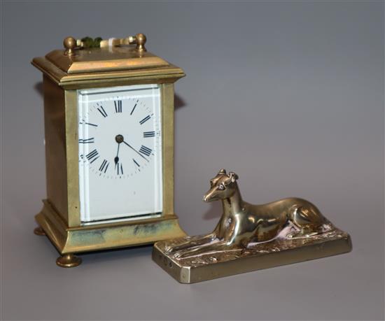 An Elkington and Co. paperweight and a small carriage timepiece